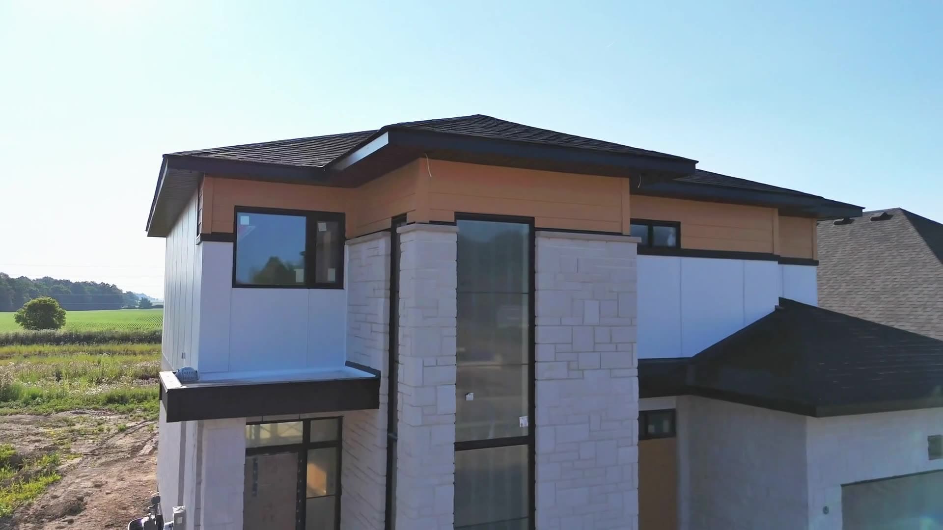 Aerial view of a completed SBR custom home on an open lot in Southwestern Ontario